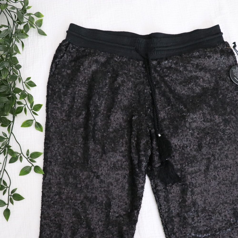 BLACK SEQUENCED JOGGERS WITH TASSELS